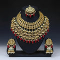 the Zevar Bridal Jewellery Set Heavy Faux Kundan Bridal Choker Set with Ruby Red Drops & Maang Tikka