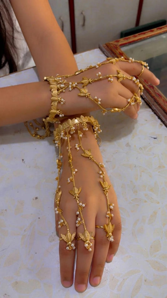 the Zevar hand Jewelry Kashmiri Brass Gold Finish Hathphool Hand Jewelry with Faux Pearls