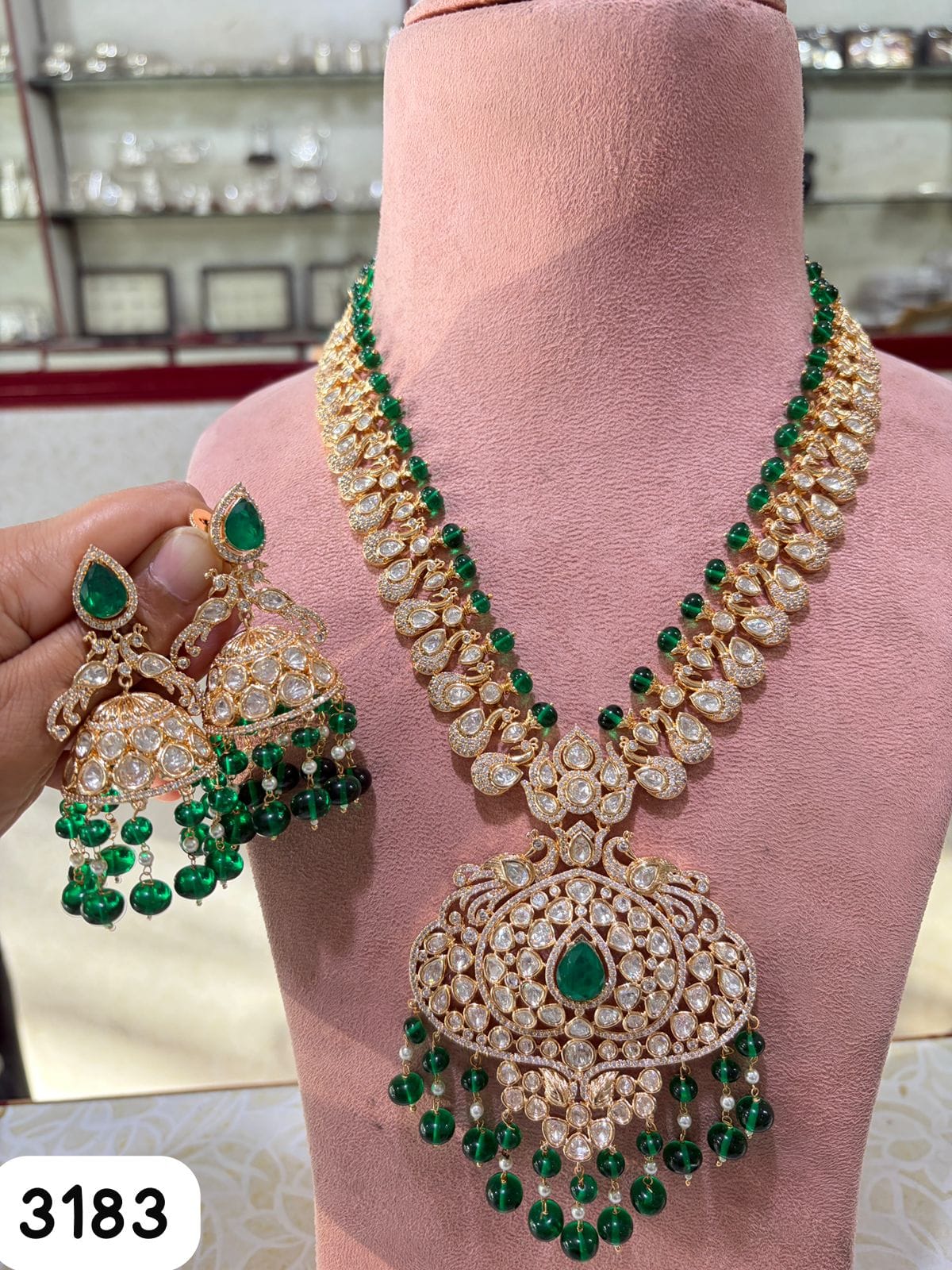 the Zevar Kundan Pulki Bridal Jewelry Set Regal Polki & Emerald Inspired Kundan Necklace Set with Jhumkas