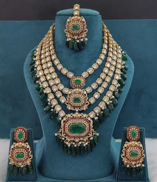 the Zevar Pulki with layered Necklace Set Emerald Green Multi-Layered Multicolor Beads Kundan Polki Necklace with Maang Tikka & Earrings
