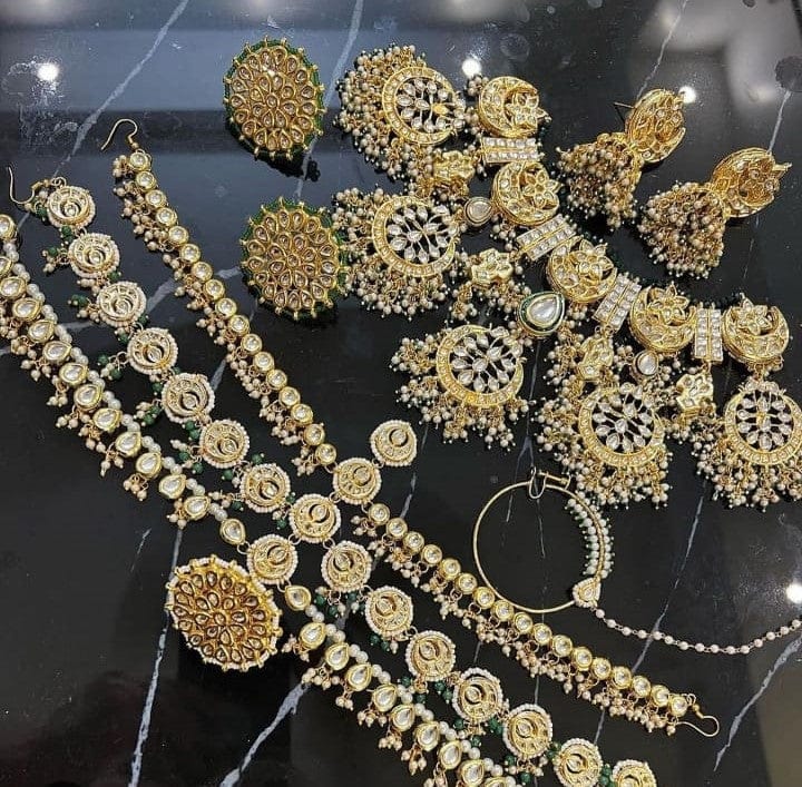 Opulent Radiance: Heavy Kundan Golden Bridal Set – Zevar
