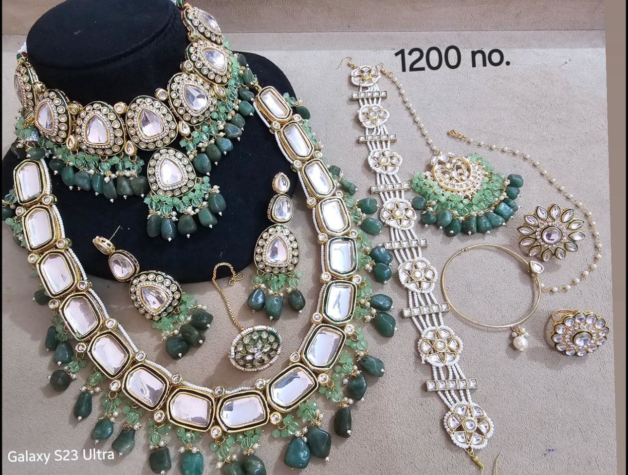 Zevar Kundan Jewelry Set With Green Beads Kundan Jewelry Set With Green Beads regal look