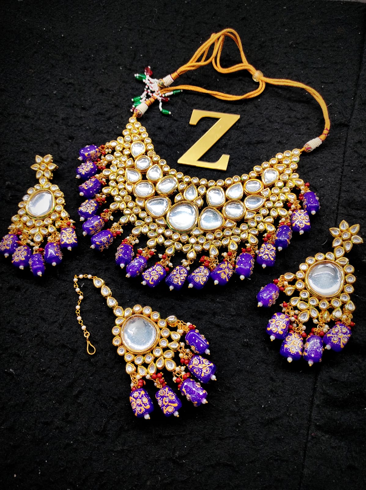 Zevar Jewelry kundan Necklace Earring With Maangtika set by Zevar