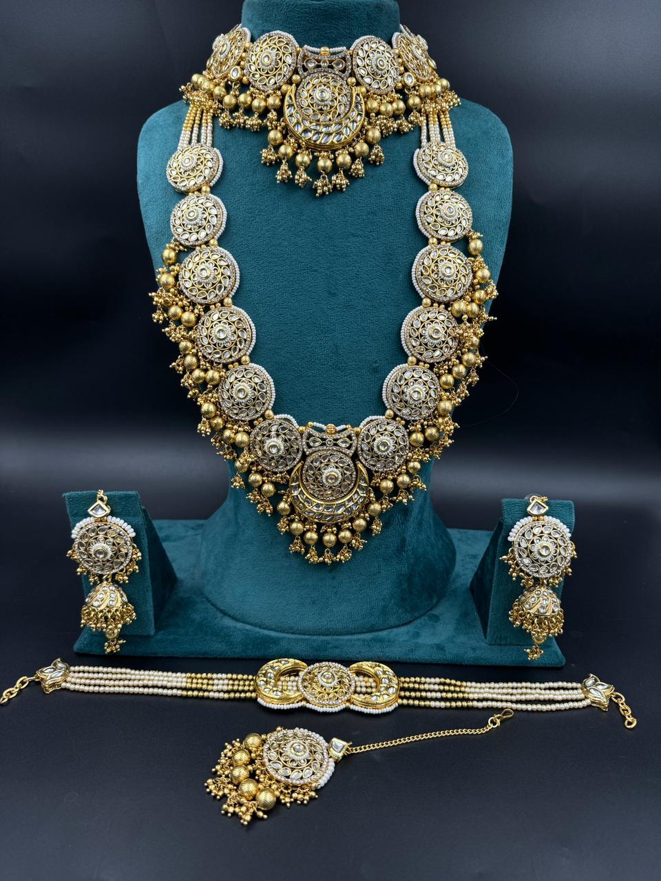 Om Sai Bridal Bridal jewelry Golden Full Heavy Bridal Jewellery Set by Zevar Jewellery