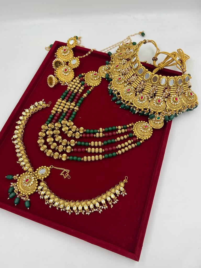Om Sai Bridal Bridal jewelry ZEVAR I Women Gold-Plated, Red & Green Enamelled Kundan Embellished Jewellery Set