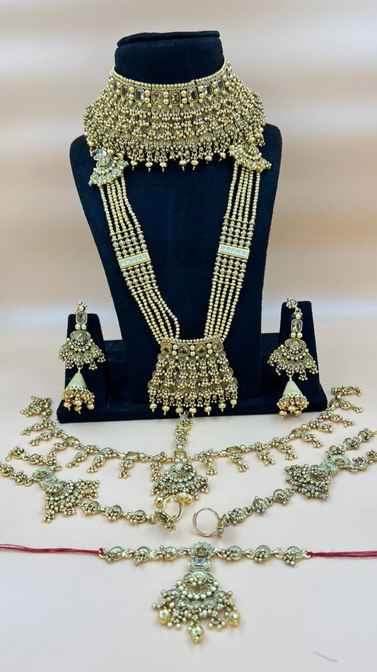 Om Sai Bridal jewelry Elegant Bridal Kundan Set: Golden White Pearl Long Necklace, Armlet, Choker, Earrings, Nath, and Mathapati | Indian Wedding Jewellery