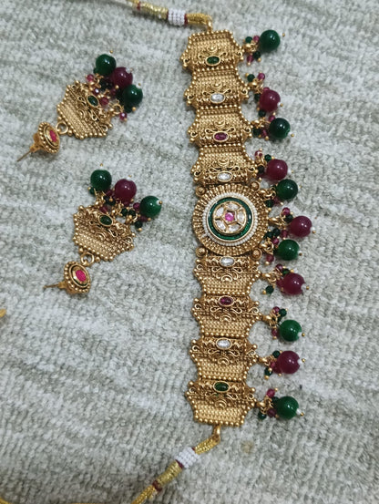 the Zevar Bridal Choker Jewellery Set Antique Gold Tone Heritage Choker Set with Ruby & Emerald Style Drops