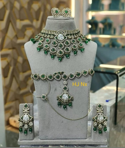 the Zevar Bridal Jewellery Set Emerald Elegance Bridal Jewelry Set with Kundan Detailing