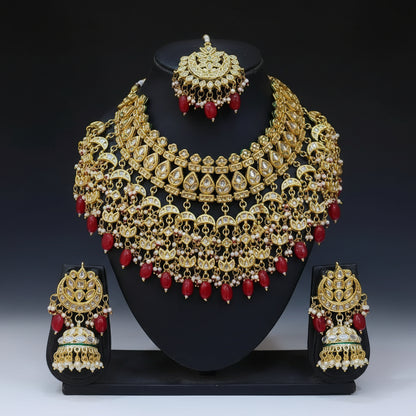 the Zevar Bridal Jewellery Set Heavy Faux Kundan Bridal Choker Set with Ruby Red Drops & Maang Tikka