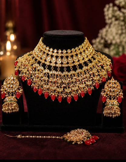 the Zevar Bridal Jewellery Set Heavy  Kundan Bridal Choker Set with Ruby Red Drops & Maang Tikka
