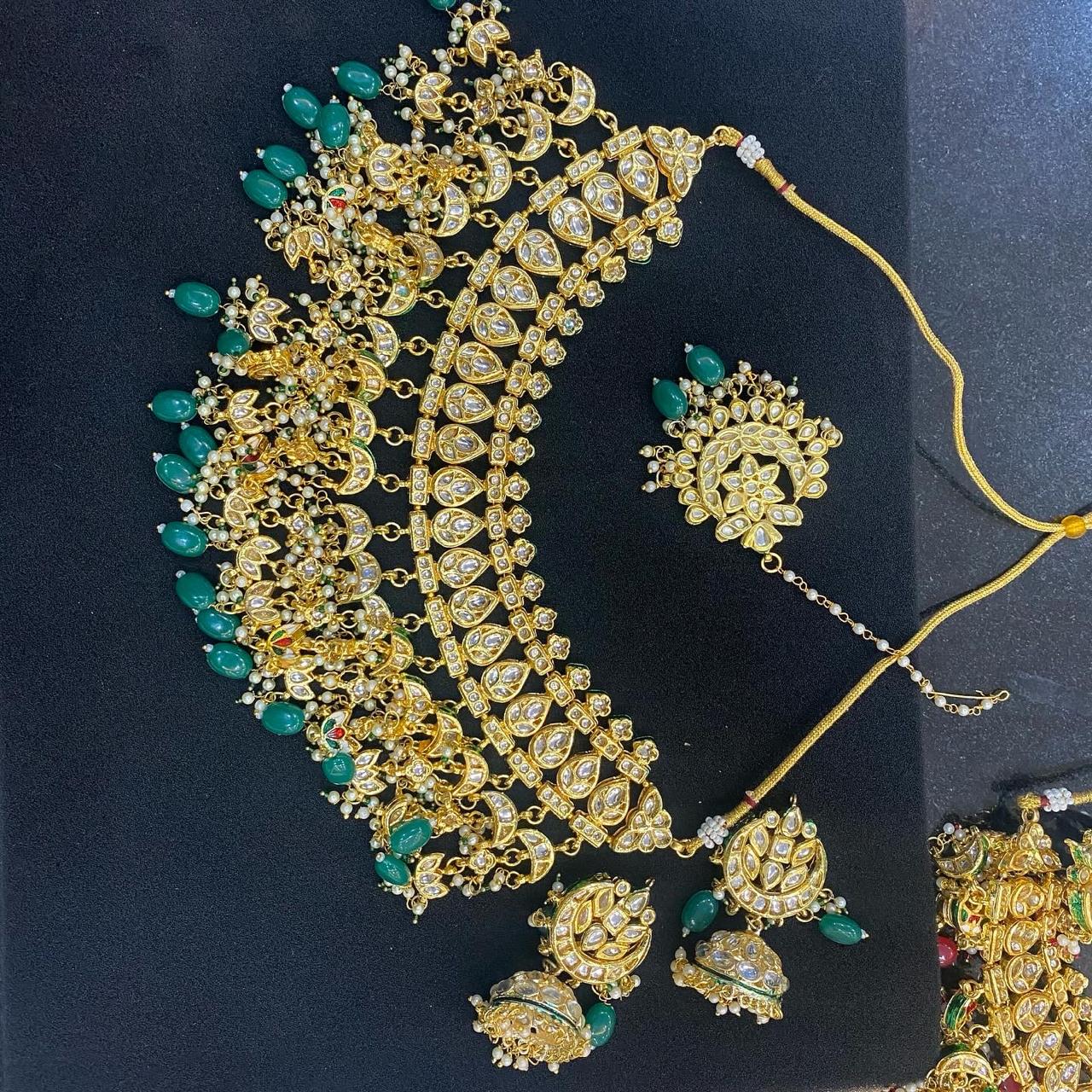 the Zevar Bridal Jewelry Set Royal Mughal-Inspired Kundan Choker Set with Emerald Green Beads and Matching Jhumkas