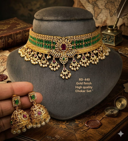 the Zevar choker necklace Dark Green Premium Gold Finish Square-Cut Stone Choker Set with Pearl Drops & Jhumkas
