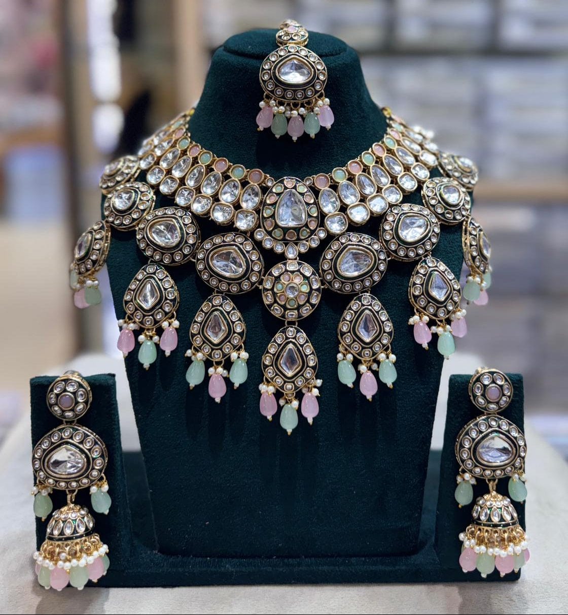 the Zevar Kundan Bridal Choker Necklace Set pink & sea green Royal Kundan Bridal Choker Necklace Set with Matching Jhumka & Maang Tikka