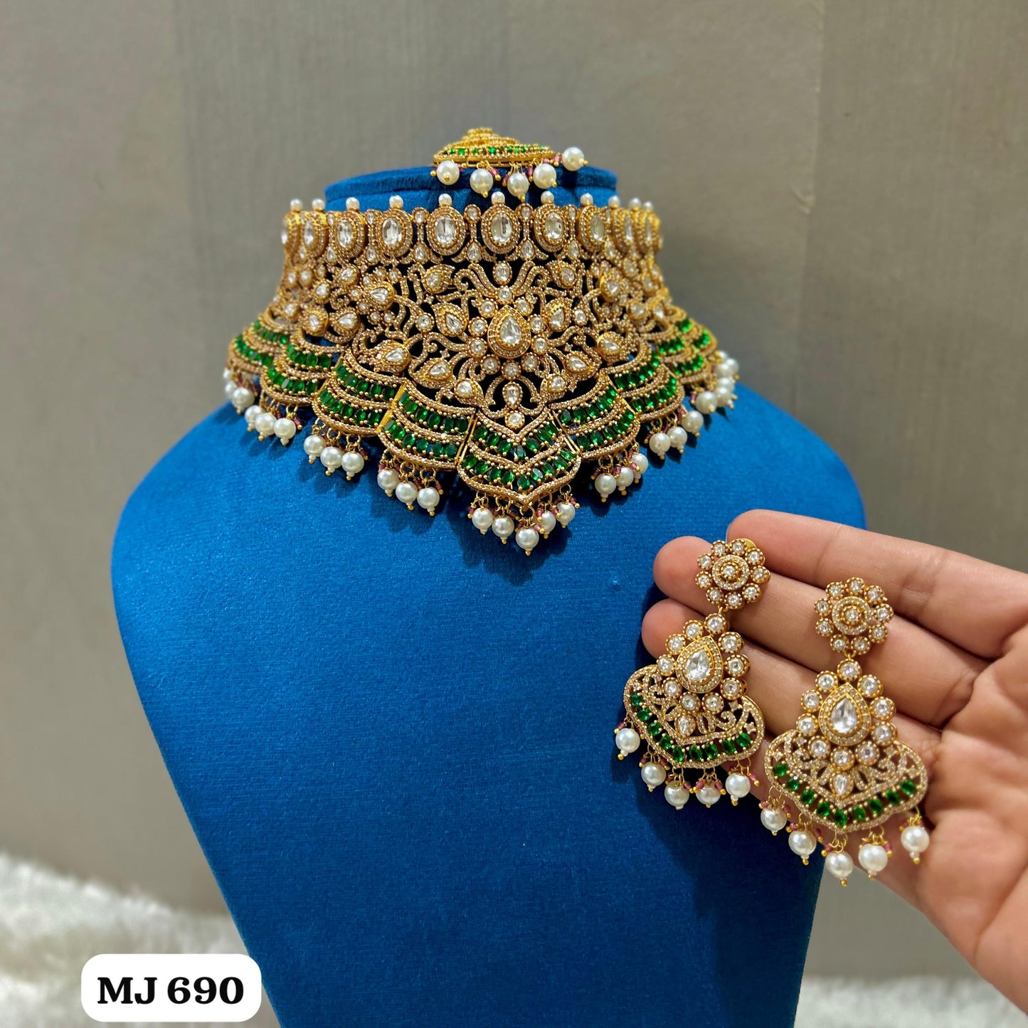 the Zevar Kundan & Pearl Choker Necklace Set Emerald Green Royal Kundan Emerald  Ruby Pearl Bridal Choker Necklace Set with Earrings and Maang Tikka