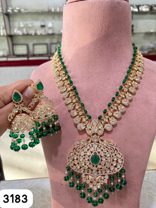 the Zevar Kundan Pulki Bridal Jewelry Set Regal Polki & Emerald Inspired Kundan Necklace Set with Jhumkas