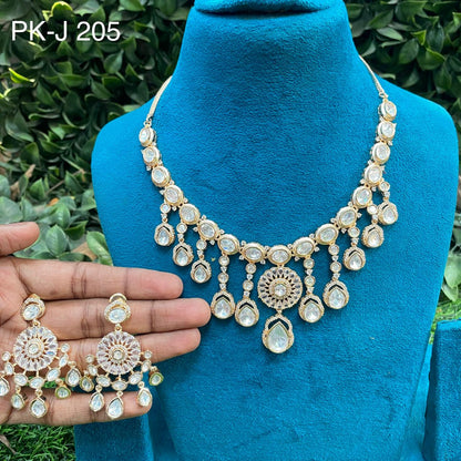 the Zevar Mozonight kundan necklace White Traditional Mozonite Kundan Choker Necklace Set with Green Stone Accents