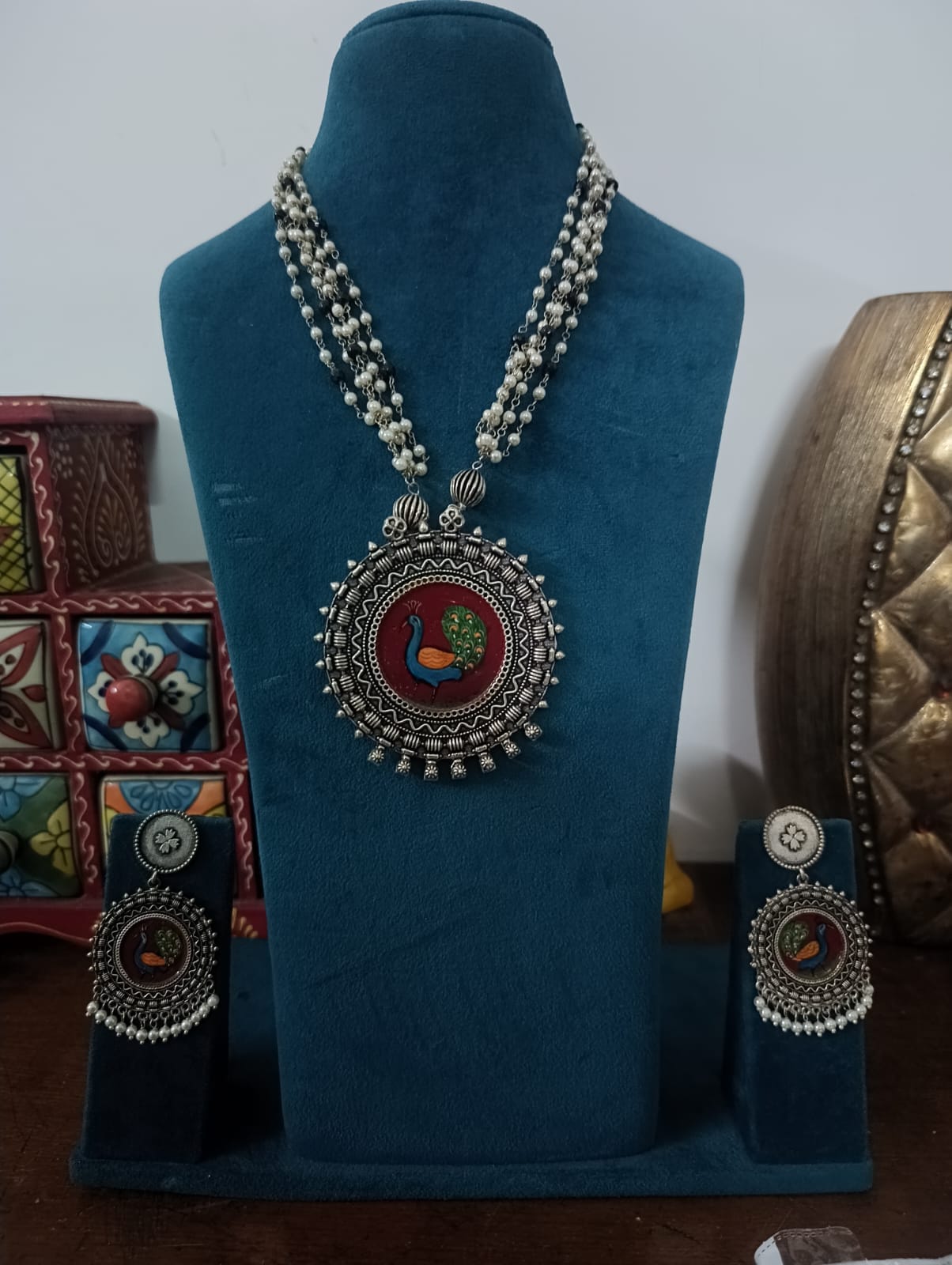 the Zevar pendant necklace set With Matching Stud Earrings Maroon The Mayura Meenakari Mala: Oxidized Peacock Statement Set