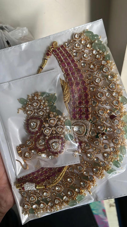 the Zevar polki bridal set Heavy Polki-Style Bridal Choker Set with Faux Rubies and Mint