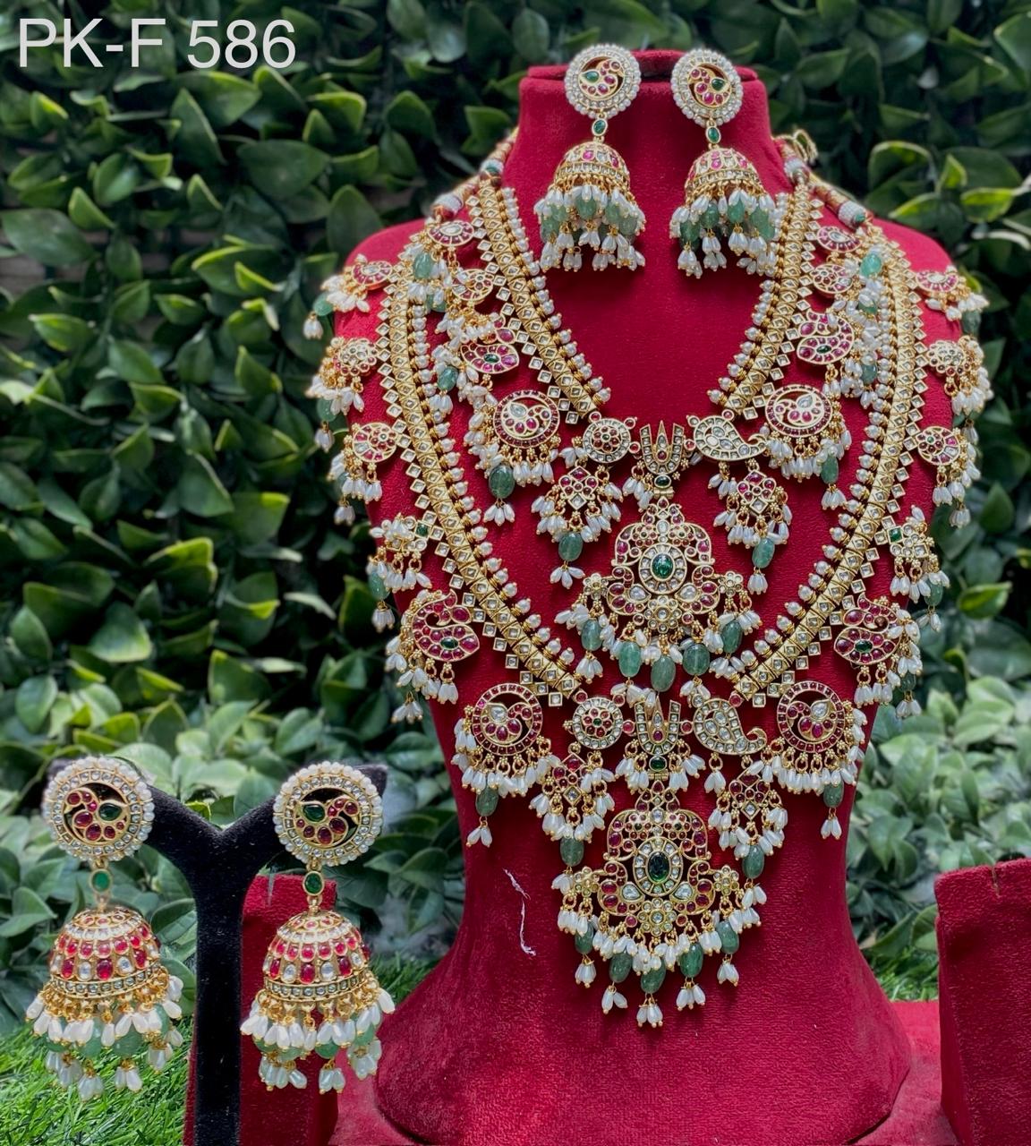 the Zevar Pulki with layered Necklace Set Exquisite Traditional Layered Bridal Necklace Set with Ruby, Emerald Stones & Pearl Drops