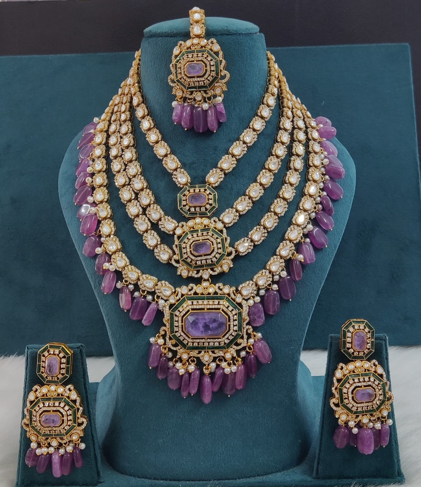 the Zevar Pulki with layered Necklace Set Purple Multi-Layered Multicolor Beads Kundan Polki Necklace with Maang Tikka & Earrings