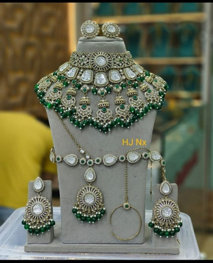 the Zevar Semi Bridal Jewelry Set Heavy Antique Kundan Semi Bridal Choker Set with Emerald Green Drops & Matha Patti