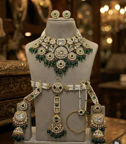 the Zevar Semi Bridal Jewelry Set Heavy Faux Kundan Semi Bridal Choker Set with Emerald Green Drops & Pearl Band Matha Patti