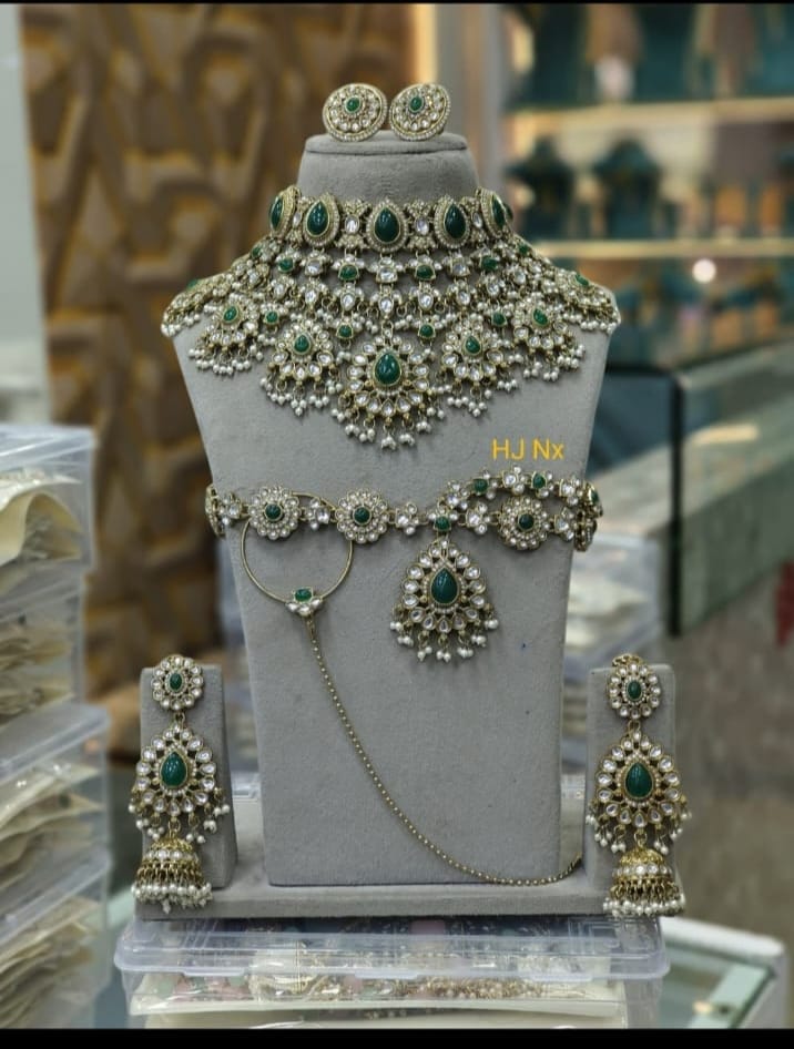 the Zevar Semi Bridal Jewelry Set Premium Faux Kundan & Emerald Semi  Bridal Choker Set with Jhumkas and Matha Patti