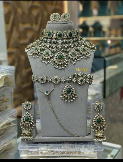 the Zevar Semi Bridal Jewelry Set Premium Faux Kundan & Emerald Semi  Bridal Choker Set with Jhumkas and Matha Patti