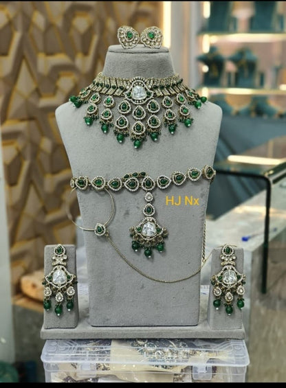 the Zevar Semi Bridal Jewelry Set Regal Emerald Semi  Bridal Jewellery Set with Matha Patti and Nath