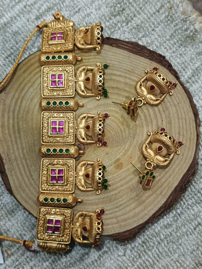 the Zevar Temple Jewellery Set Zevar Antique Gold Temple Choker Set with Ruby & Emerald Tones