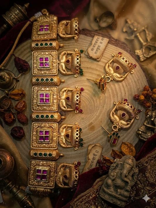 the Zevar Temple Jewellery Set Zevar Antique Gold Temple Choker Set with Ruby & Emerald Tones