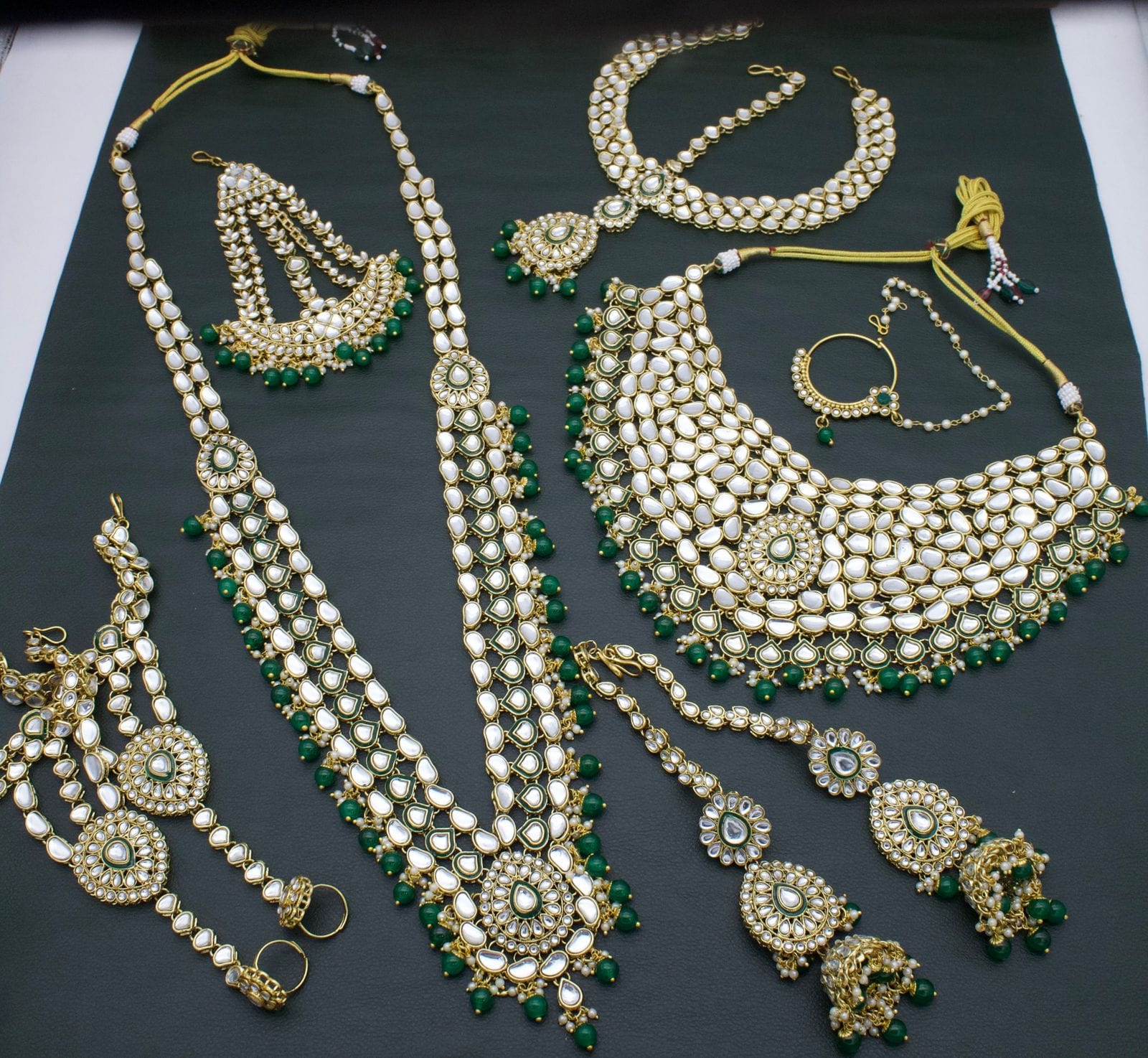 Zevar Bridal jewelry Green Kundan Bridal Jewellery Set with Intricate Detailing