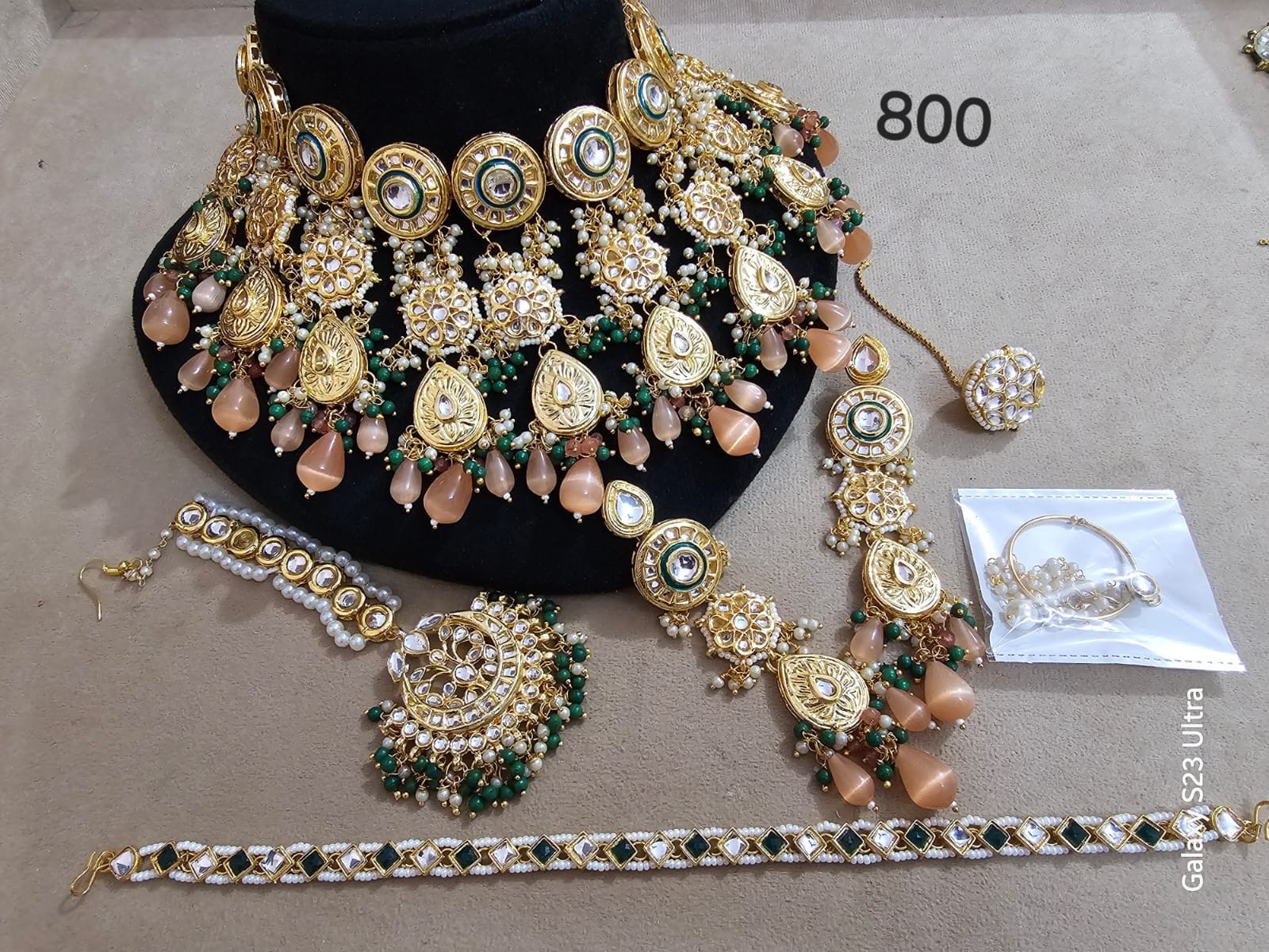 Zevar Kundan Bridal Jewellery Gold-Plated Kundan Bridal Set with Peach and Green Beads