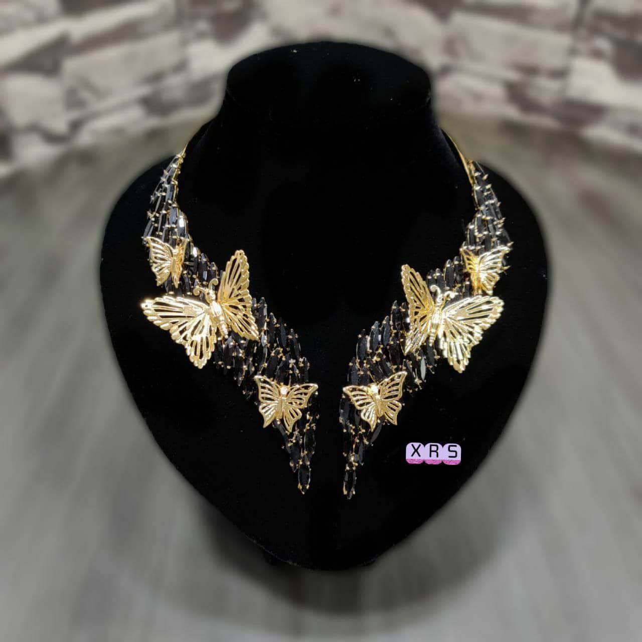 Our popular Angel Choker is now available with 3D butterflies and in superlative rose-gold plating - Zevar