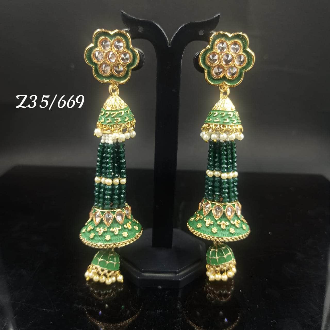 Zevar Earrings Green Kundan Pearl Earrings Jhumkas Design By Zevar
