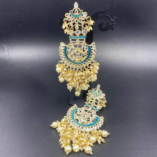 Zevar Earrings Kundan And Pearl Chand Bali With Ruby Stones From Zevar Jewellery.
