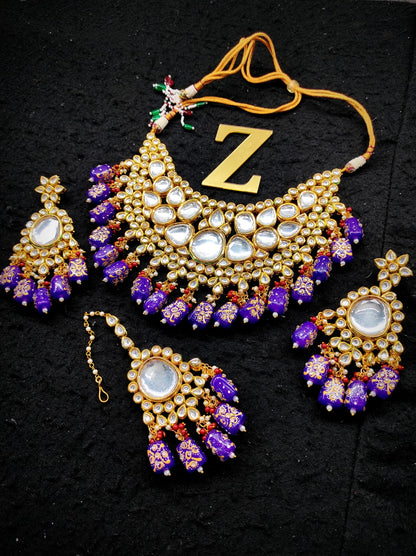 Zevar Jewelry kundan Necklace Earring With Maangtika set by Zevar