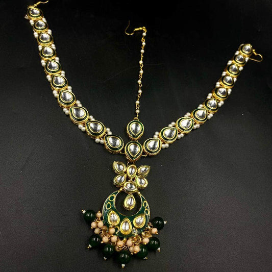 Zevar Maangtikka Kundan Bridal Matha patti with pearl emerald and gold accents ,Indian jewelry ,Indian Mathapatti By Zevar.
