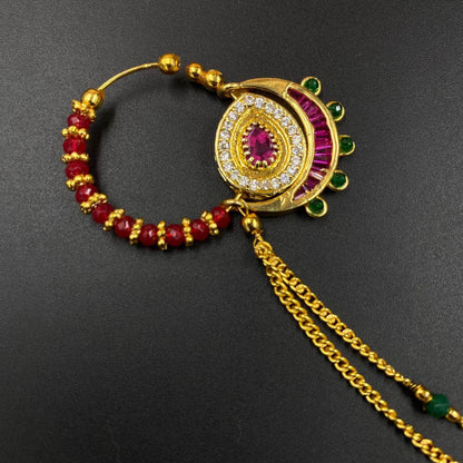 Zevar Nath Gold-Plated & Mehroon -Studded Pearl Chained Bridal Nose Pin By Zevar