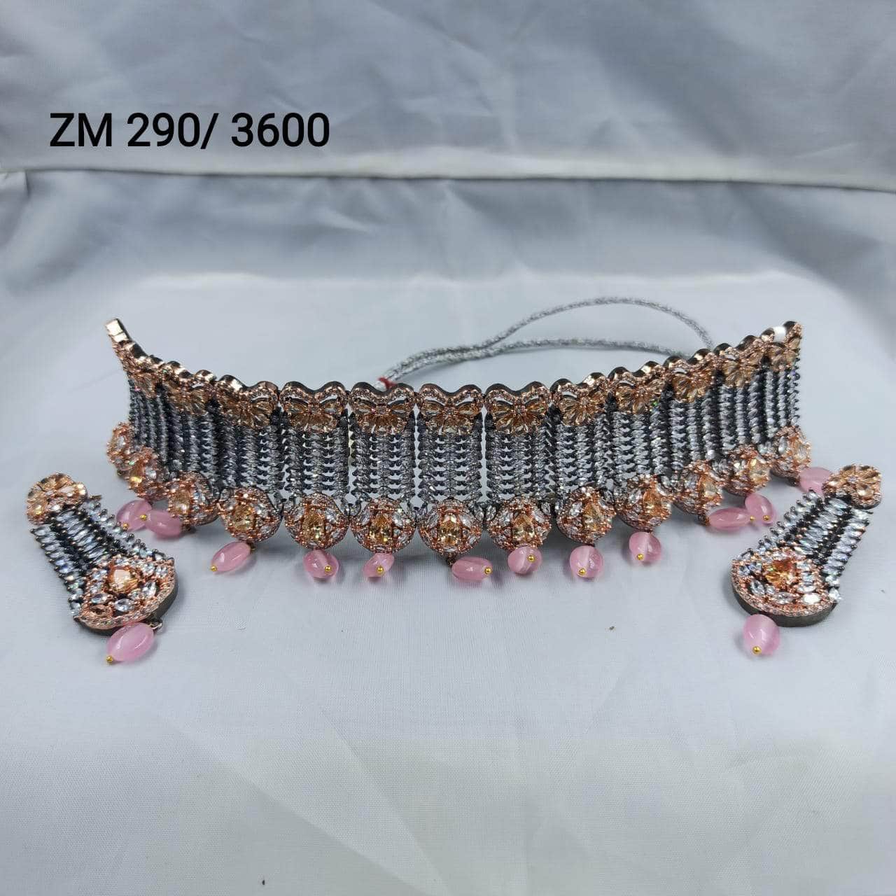 Zevar necklace ad Gold-Plated American Diamond Studded Jewellery Set